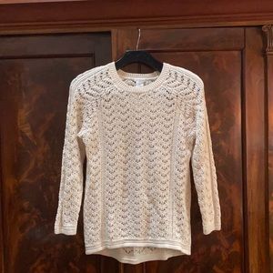Crochet sweater with cutout shoulder detail